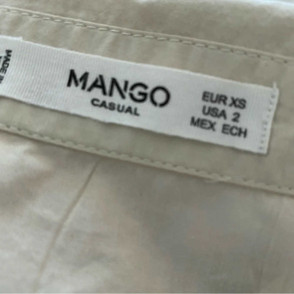 Mango shirt dress with clinched waist belt. Ruffles on top, in cream or beige. - Picture 6 of 6